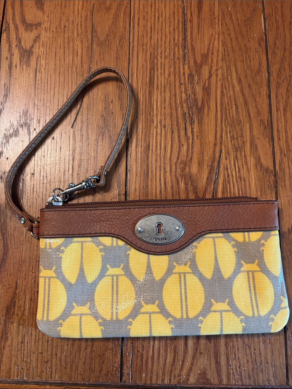 Fossil Yellow and Brown Patterned Wristlet Clutch